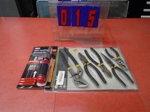 Set of pliers & auto load screwdrivers. As shown.