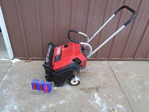 Toro S-200 snow thrower with electric start.Tested & works. As shown.