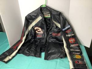 lot 8 image: Wilson Leather Racing Jacket XL and 5 Binders of Racing Trading Cards