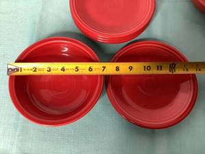 lot 28 image: Red Fiesta Ware - 4 Bowls and 5 Small Plates