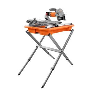 lot 303 image: RIDGID 9 Amp Corded 7 in. Wet Tile Saw with Stand, R4031S - Damaged Drain Plug.