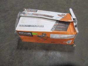 lot 302 image: RIDGID 9 Amp Corded 7 in. Wet Tile Saw with Stand - Missing Parts (TUB and More) - Mainly working motor, pump and stand parts - For PartsRestore.
