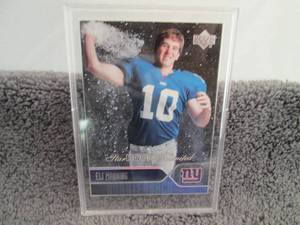 lot 94 image: 94. 2004 Upper Deck Eli Manning Roo...
