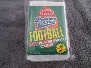 lot 184 image: 184. 8 1990 Fleer Football Packs...