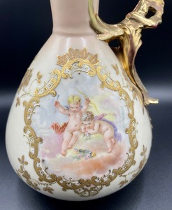 lot 52 image: Vintage Robert Hanke Made in Austria Cupid and Gold Accented Ewer