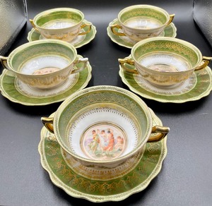 lot 61 image: Five R. Briggs Creamers with Double Handled Saucers