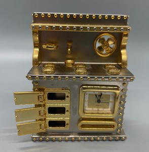 lot 123 image: Pierre Cardin Mini Kitchen Stove Collectible Clock