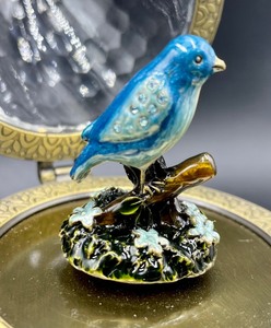 lot 396 image: Decorative Musical Egg Figurine with Bird Figurine