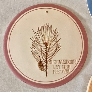 lot 279 image: Chequamegon Fat Tire Festival Pottery Disks
