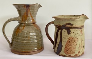lot 27 image: Two Pottery Pitchers
