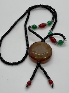 lot 488 image: Beaded Bolo Tie with Polished Agate w Horse Design