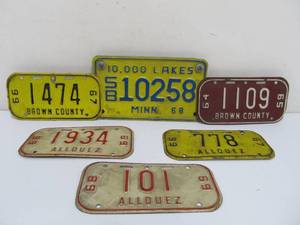 lot 30 image: Group of Vintage Motorcycle License Plates
