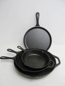 lot 106 image: Lot of 4 LODGE Cast Iron Skillets