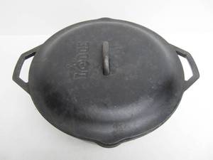 lot 107 image: LODGE Cast Iron 10DOL Dutch Oven