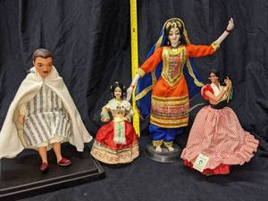 lot 130 image: Colorful Ethnic Dolls
