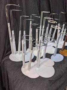lot 150 image: Assortment of Doll Stands