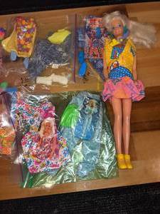 lot 82 image: HUGE Lot of Barbie Clothes