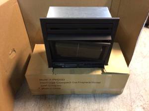 20,000 BTU 36 in. Compact Convertible Ventless Natural Gas Fireplace in Heritage by Pleasant Hearth Customer Returns See Pictures