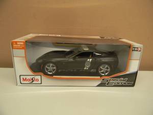 lot 27 image: MAISTO SPECIAL EDITION - 118 SCALE 2014 CORVETTE STINGRAY SAFETY, SERVICE and SECURITY - GREAT PIECE - NEW IN BOX - SEE PICTURES
