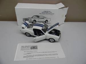 lot 30 image: REVELL THE CREATIVE MASTERS COLLECTION 120 SCALE 1965 SHELBY MUSTANG GT-350 - NEW IN BOX - CRAZY AWESOME PIECE - SEE PICTURES