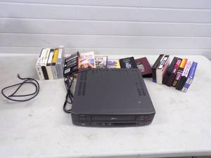 lot 44 image: Zenith VCR with Tapes