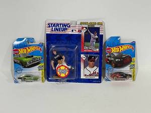 lot 74 image: 1993 Greg Maddux and Hot Wheels