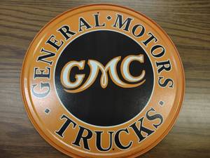 lot 88 image: GMC Trucks Tin Sign, 12...