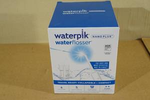 lot 228 image: Waterpik Nano Plus Water Flosser