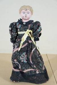 lot 85 image: Antique Tin Head Doll