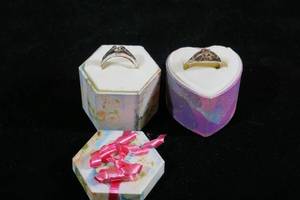 lot 5 image: 2 Silver Tone Rings - Clear Stones