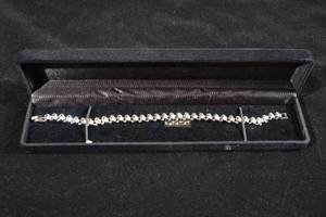 lot 15 image: Silver Tone Swarovski Crystal Tennis Bracelet