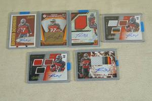 lot 69 image: Ronald Jones Insert Cards - Autos, Jersey, Multi Color