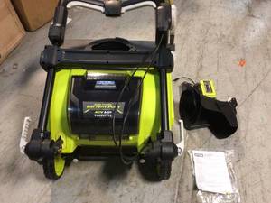 lot 20 image: 40V HP Brushless 21 in. Cordless Single Stage Snow Thrower Tool Only  batteries are not Include by RYOBI Customer Returns See Pictures