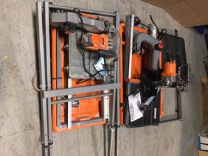 lot 23 image: Lot of Assorted Ridgid Tile Saw Customer Returns See Pictures
