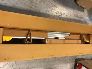 lot 26 image: 29 lbs. Heavy Duty Miter Saw Stand with 500 lbs. Capacity by DEWALT Customer Returns See Pictures