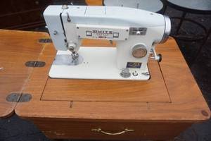 lot 67 image: White Model 568 Sewing Machine With Cabinet