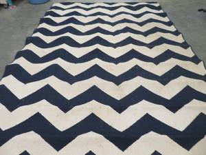 lot 53 image: INDOOR OUTDOOR RUG