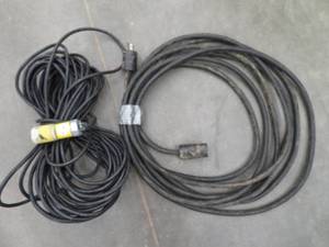 lot 84 image: HEAVY DUTY EXTENSION CORD.  LIGHTER DUTY EXTENSION CORD.