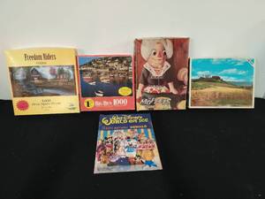 lot 51 image: Collection of Puzzles and Disney on Ice Program