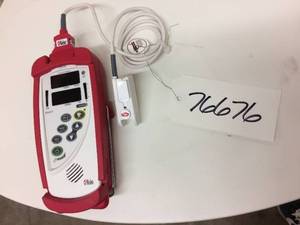 lot 1 image: WOW MSRP $5000 Masimo Rad-57 Handheld Pulse Oximeter - Unit Is Capable Of Measuring Total Hemoglobin (SpHb), Carboxyhemoglobin (SpCO), Methemoglobin (SpMet) &amp Total Arterial Oxygen Content (SpOC) - Great Working Condition Includes Boot Cover