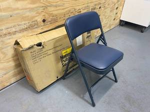 lot 117 image: NATIONAL PUBLIC SEATING Blue Vinyl Padded Seat Stackable Folding Chair (Set of 4)