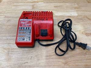lot 105 image: MILWAUKEE M12 and M18 12-Volt18-Volt Lithium-Ion Multi-Voltage Battery Charger