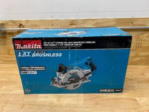 lot 1 image: MAKITA 18-Volt X2 LXT 5.0Ah Lithium-Ion (36-Volt) Brushless Cordless Rear Handle 7-14 in. Circular Saw Kit