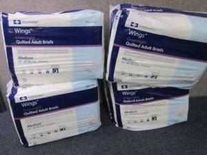 lot 11 image: 4- 12 ct Covidien Quilted Adult Bri...