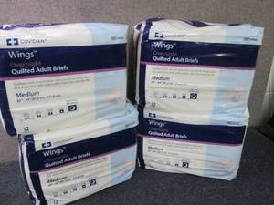 lot 15 image: 4- 12 ct Covidien Quilted Adult Bri...