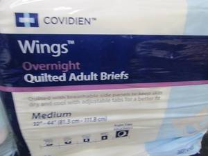 lot 24 image: 4- 12 ct Covidien Quilted Adult Bri...