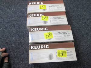 lot 148 image: 4 Keurig Water Filter Starter Kits...