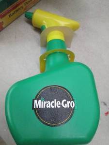 lot 49 image: 7 miracle gro battery powered spray...