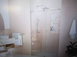 lot 100 image: 48 in. x 78 in. Frameless Sliding S...