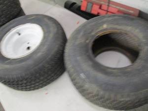 lot 164 image: 4 lawnmower tires and three rims ...